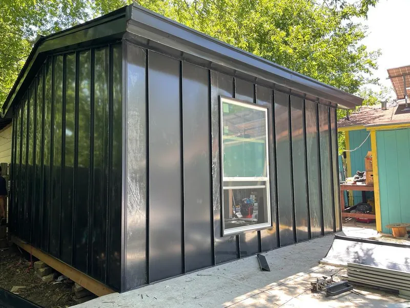 Black standing seam metal wall panels for Roof Inspection in Minden