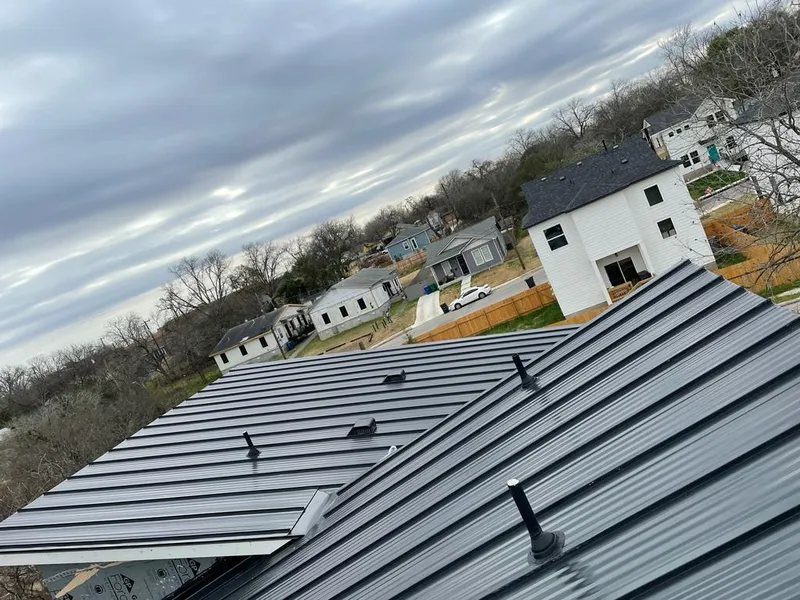 Standing seam metal roof panels with vents for Skylight Repair in Minden